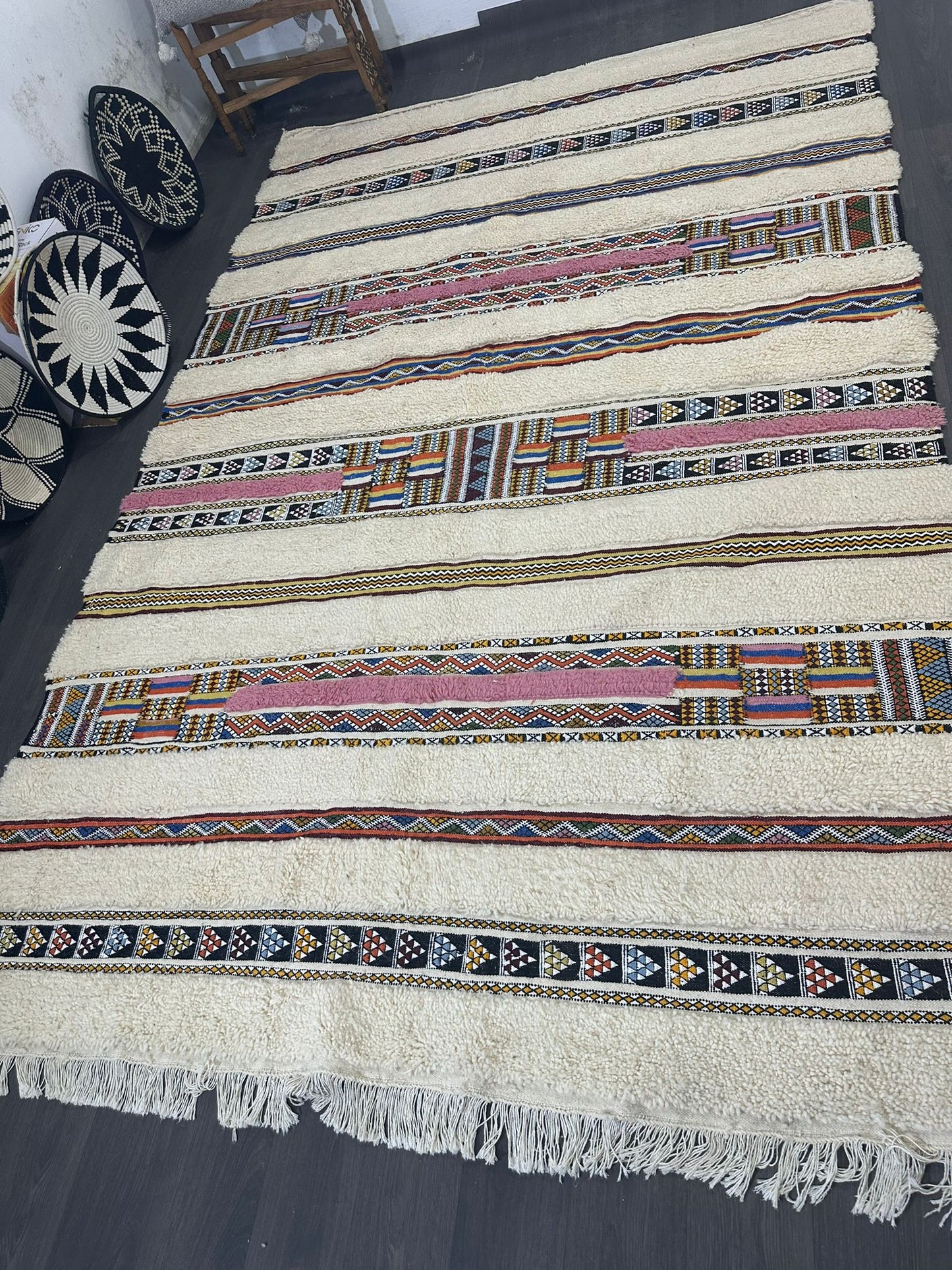 Textile with geometric patterns on a dark surface
