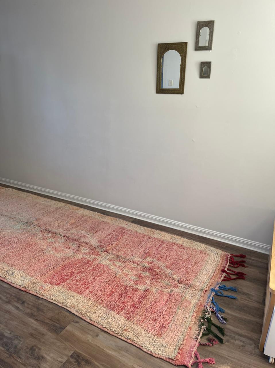 large peach pink rug