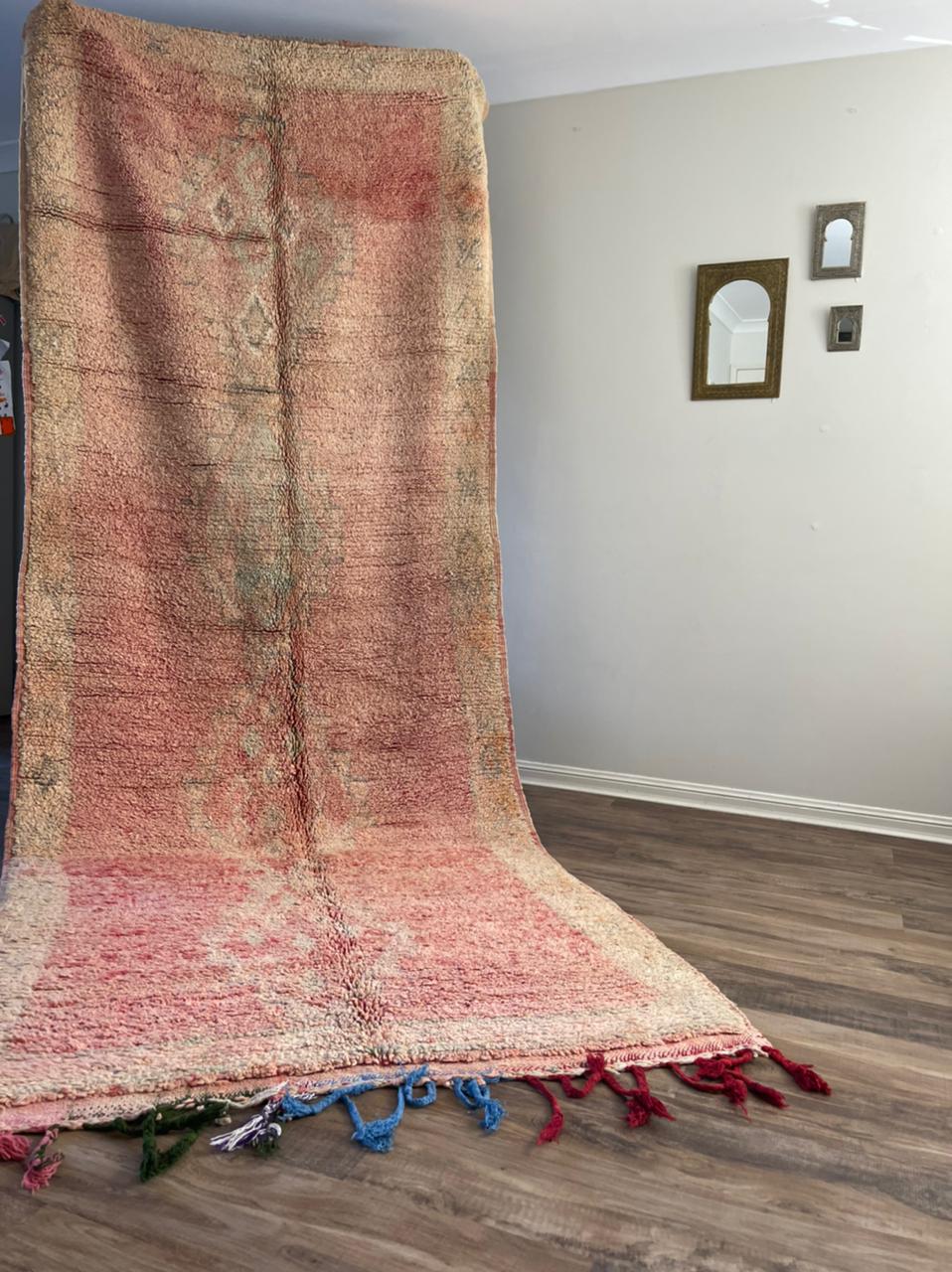 large peach pink rug
