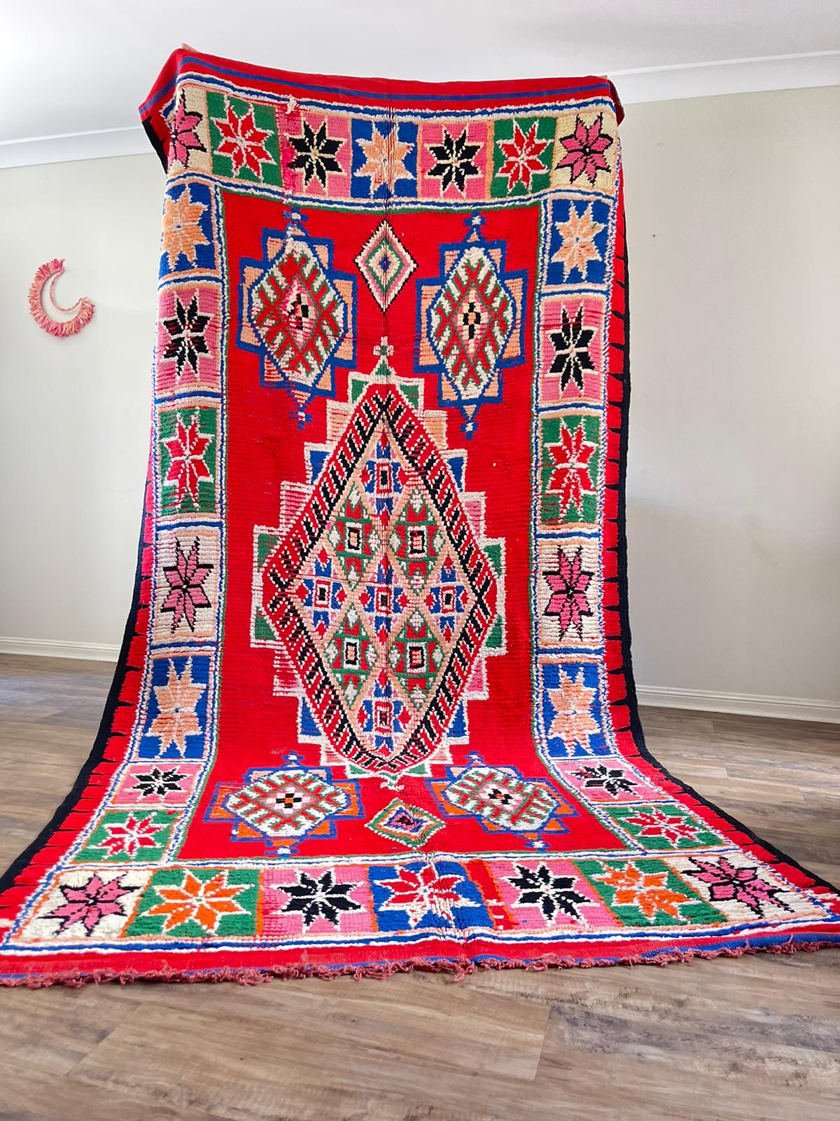 Red Moroccan vintage rug with tribal multi-coloured designs
