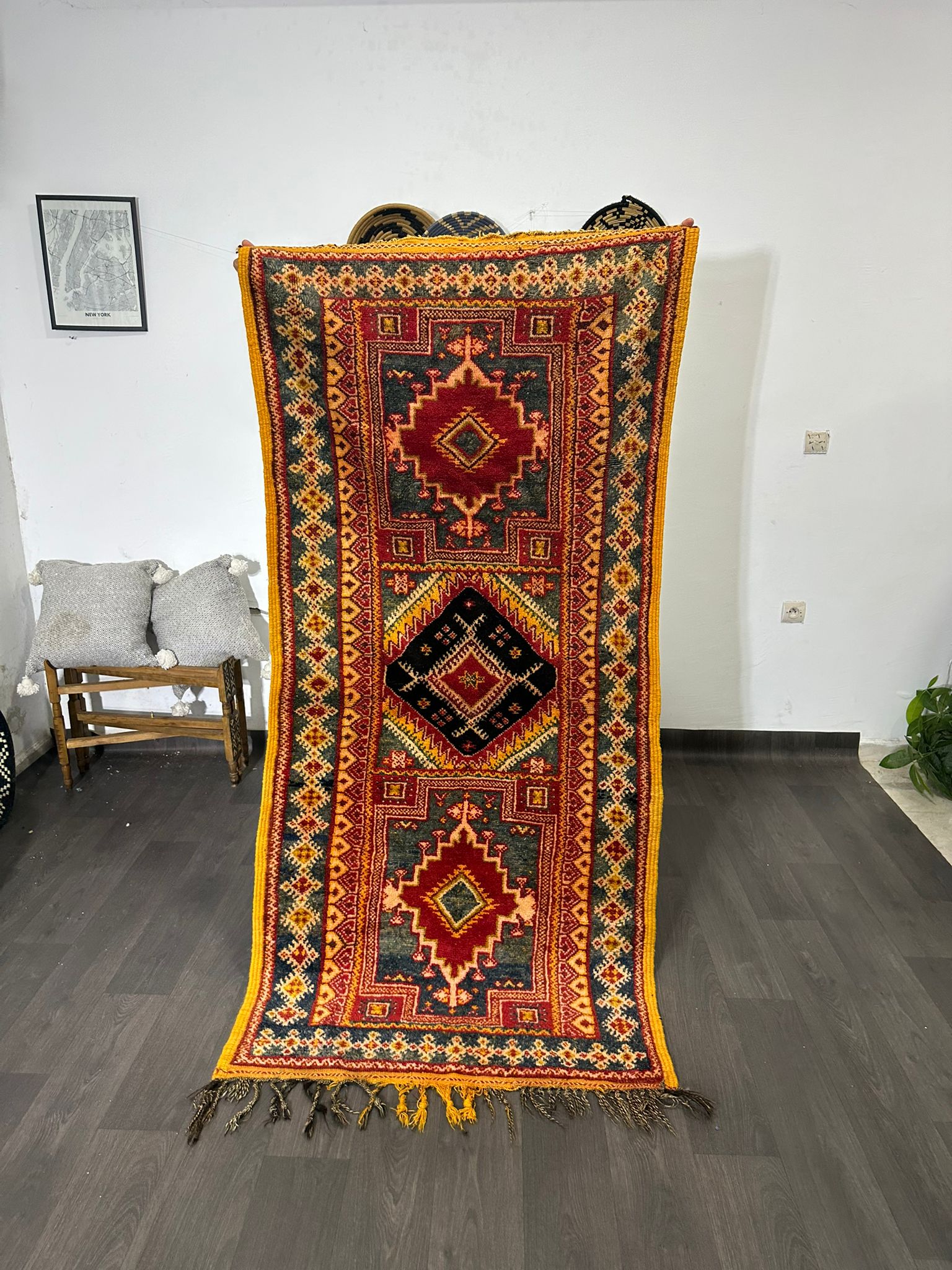 video of Vintage moroccan rug with geometric pattern on a wooden floor